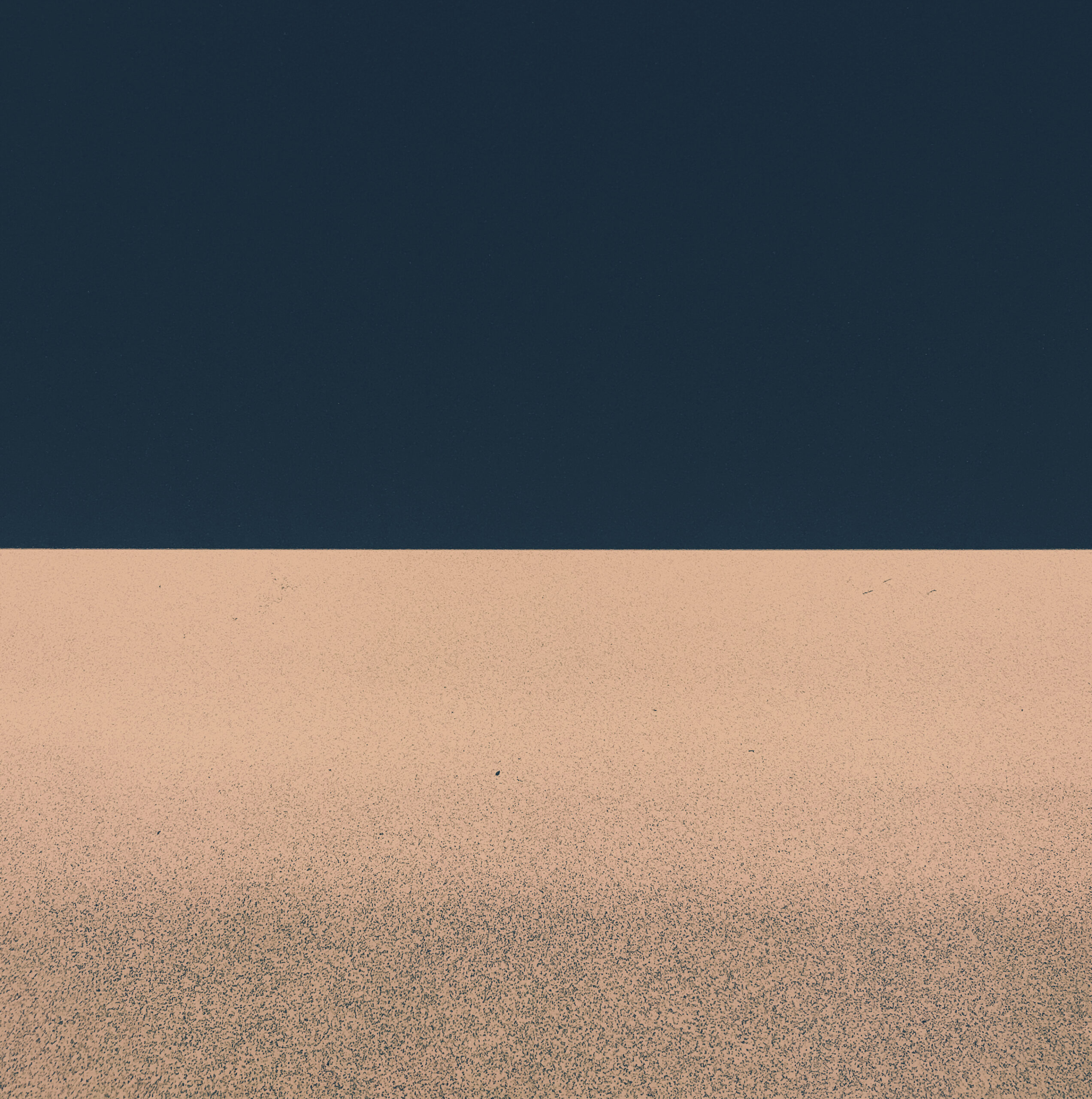 Flat horizon dividing a pale ground from a dark sky